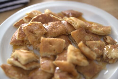 sourdough pancakes cut on plate